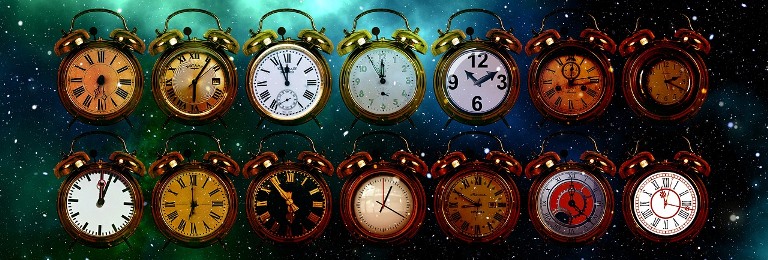 banner of 14 old fashioned alarm clocks, 7 in each row, with a dark, starry background