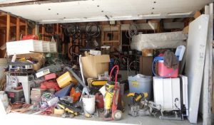 disorganized cluttered garage